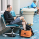 The author playing Pikmin 3 on a Wii U in an airport in 2013